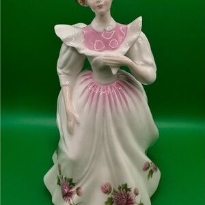 Royal Doulton Figurine “November”-modelled by Peggy Davies.